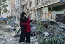 Russian attack on Ukraine capital kills at least 3 and traps others in damaged buildings