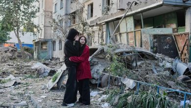 Russian attack on Ukraine capital kills at least 3 and traps others in damaged buildings