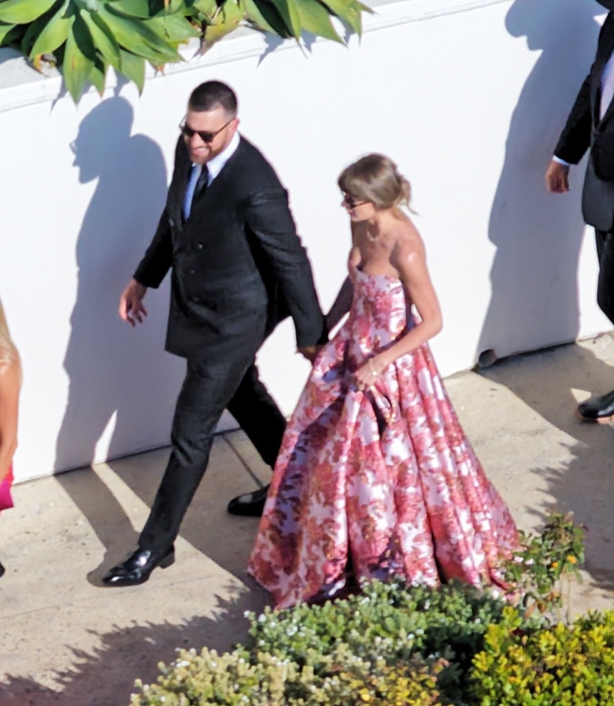 Taylor Swift is pretty in pink at JuJu Smith-Schuster’s wedding one week after marrying Travis Kelce