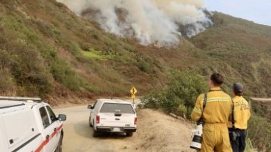 Quickly spreading wildfires trigger evacuations along Calif. coast