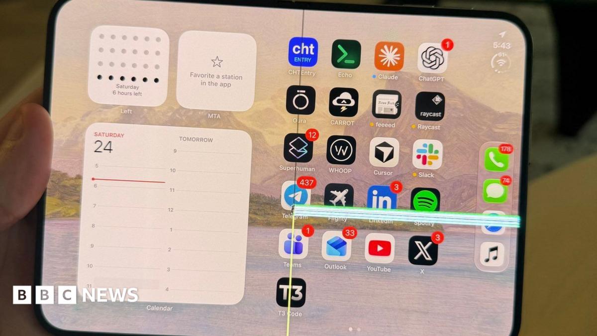An image of an iPhone Duo with a faulty screen lines across the right side of the folding screen.