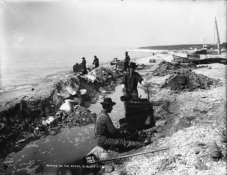 Prospectors rocking out gold on the beach at Bluff, Alaska, ca 1900 (HEGG 627).jpeg