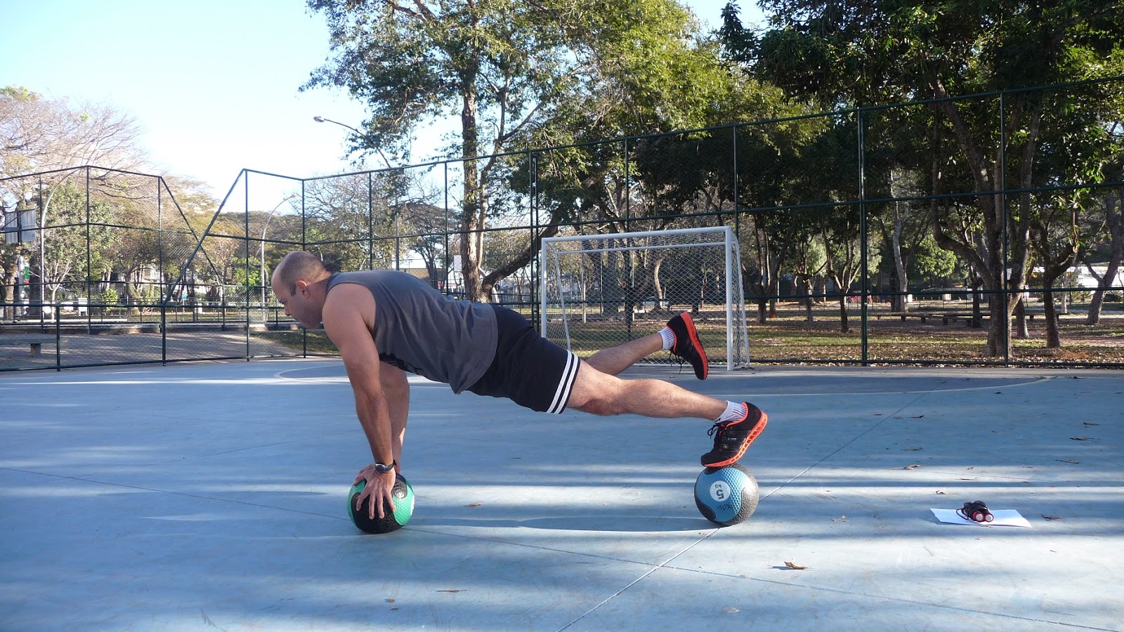 Plank with medicine ball.JPG