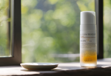 AI-generated image: A white skincare product bottle with a pump mechanism is in the foreground.