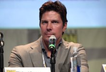 Michael Trucco working out at home in a garage with fitness equipment