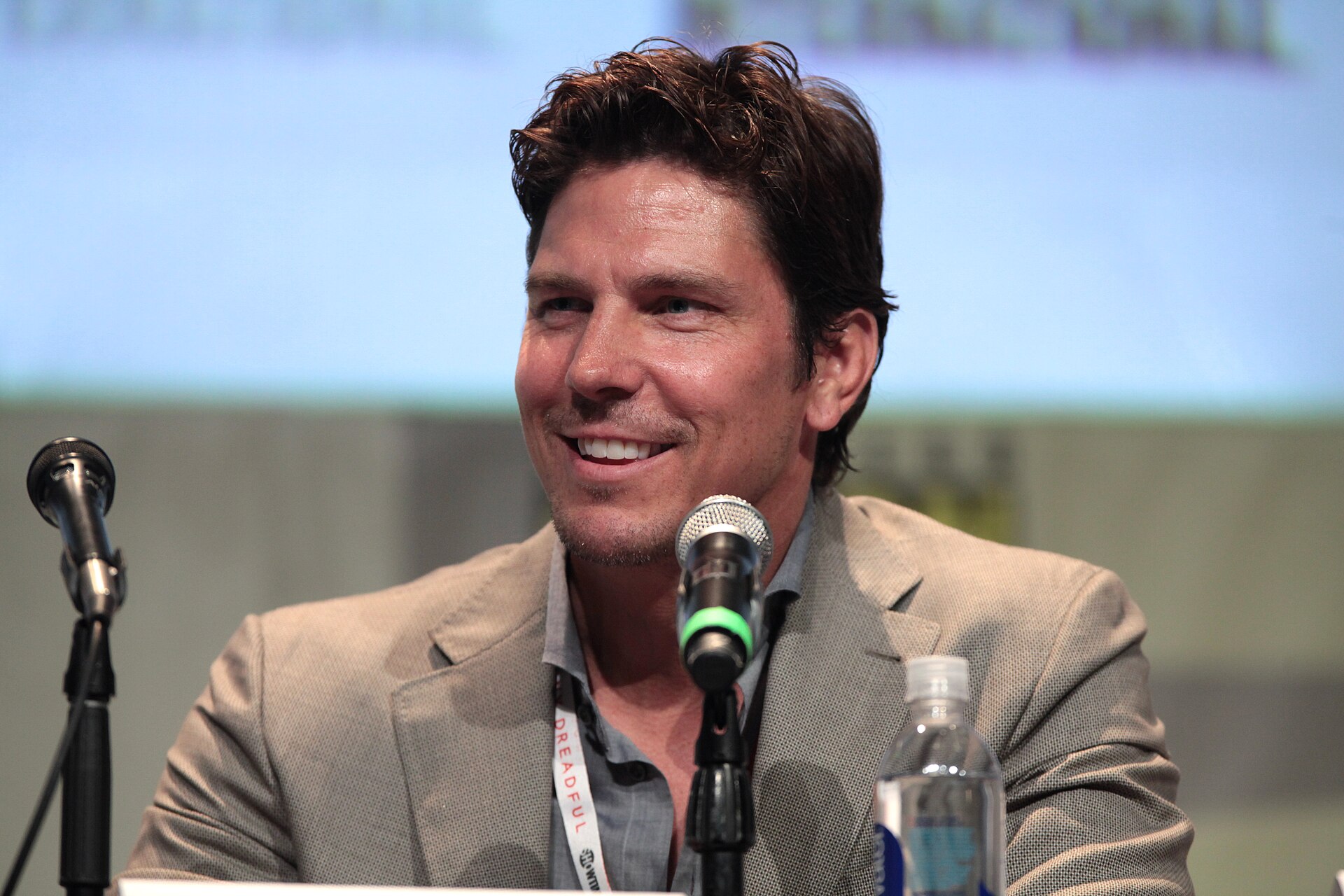 Michael Trucco working out at home in a garage with fitness equipment