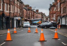 AI-generated image: The image shows a wet, dark street in a residential area.