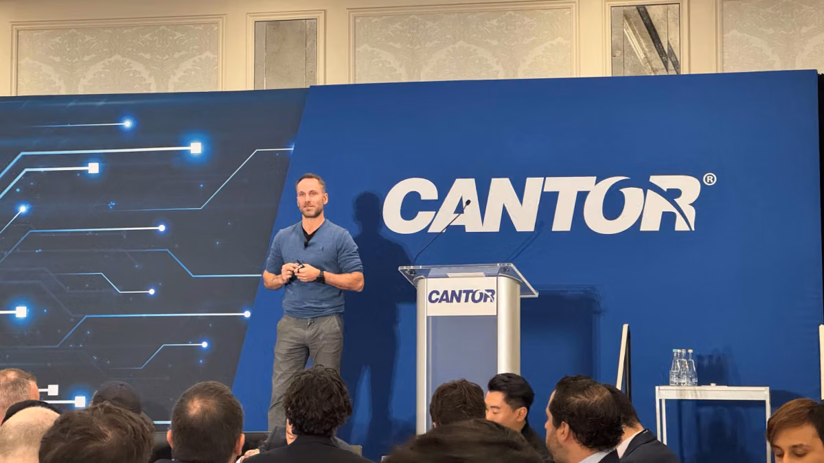 Tether CEO Paolo Ardoino on stage at Cantor Fitzgerald's event in New York (Helene Braun/CoinDesk)