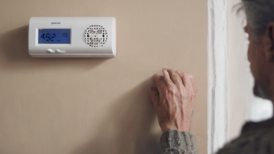 AI-generated image: A close-up shot of a wall with a digital thermostat mounted on it.